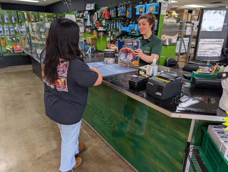 Assisting Customer At Counter Picture