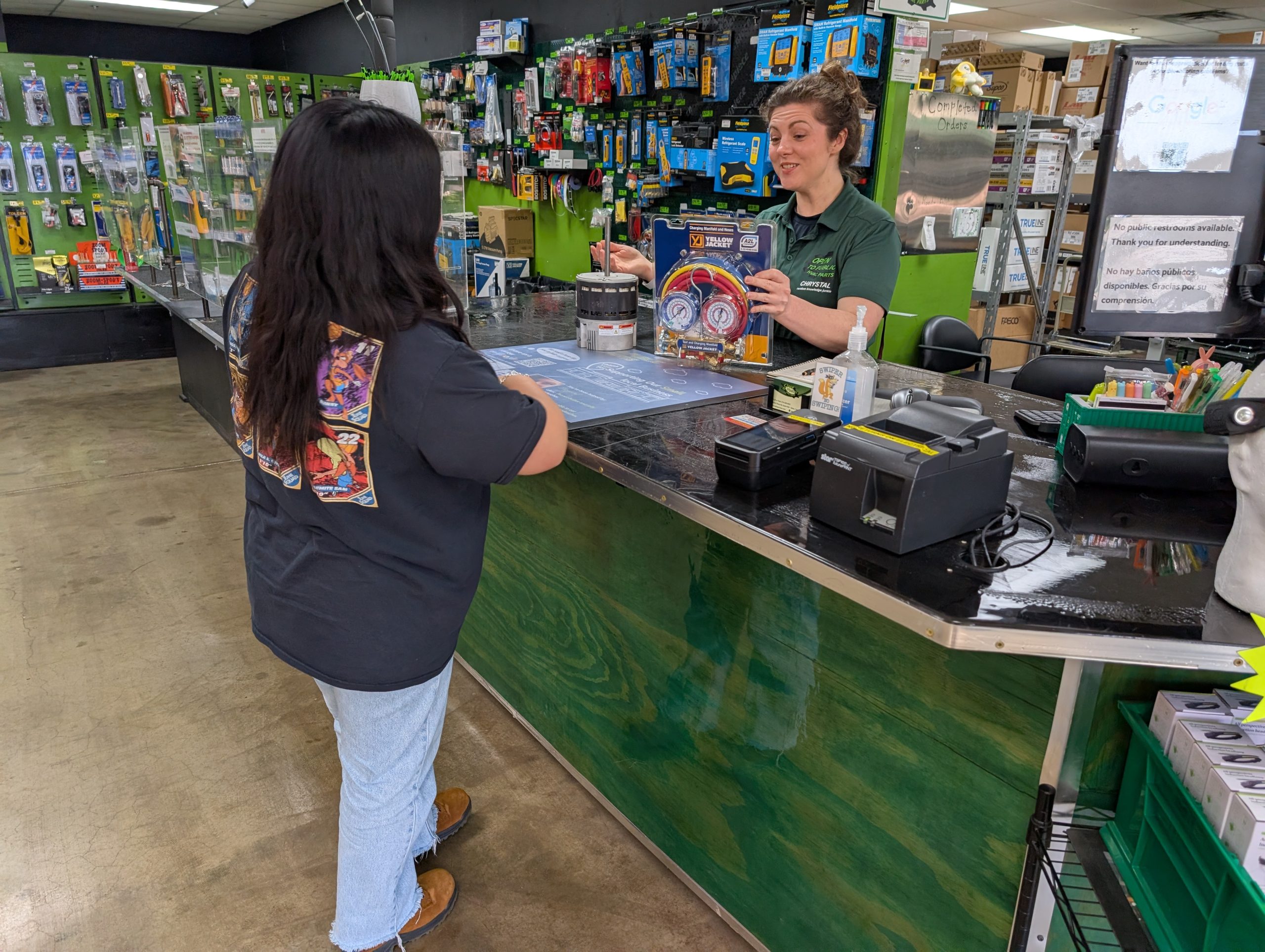 Assisting Customer At Counter Picture